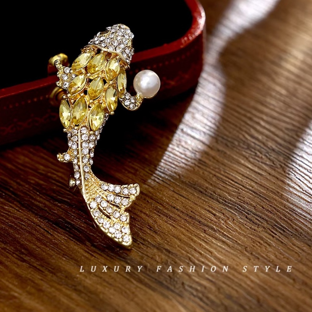 Elegant Gold Fish Brooch with Pearl Accent